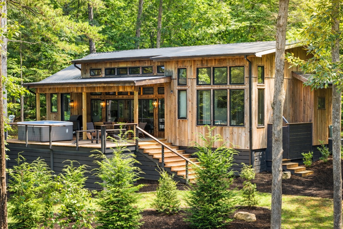 Tucked into the trees, Lantern Landing blends warm wood finishes, expansive windows, and inviting outdoor spaces for the perfect mountain escape. Enjoy total privacy surrounded by nature.
