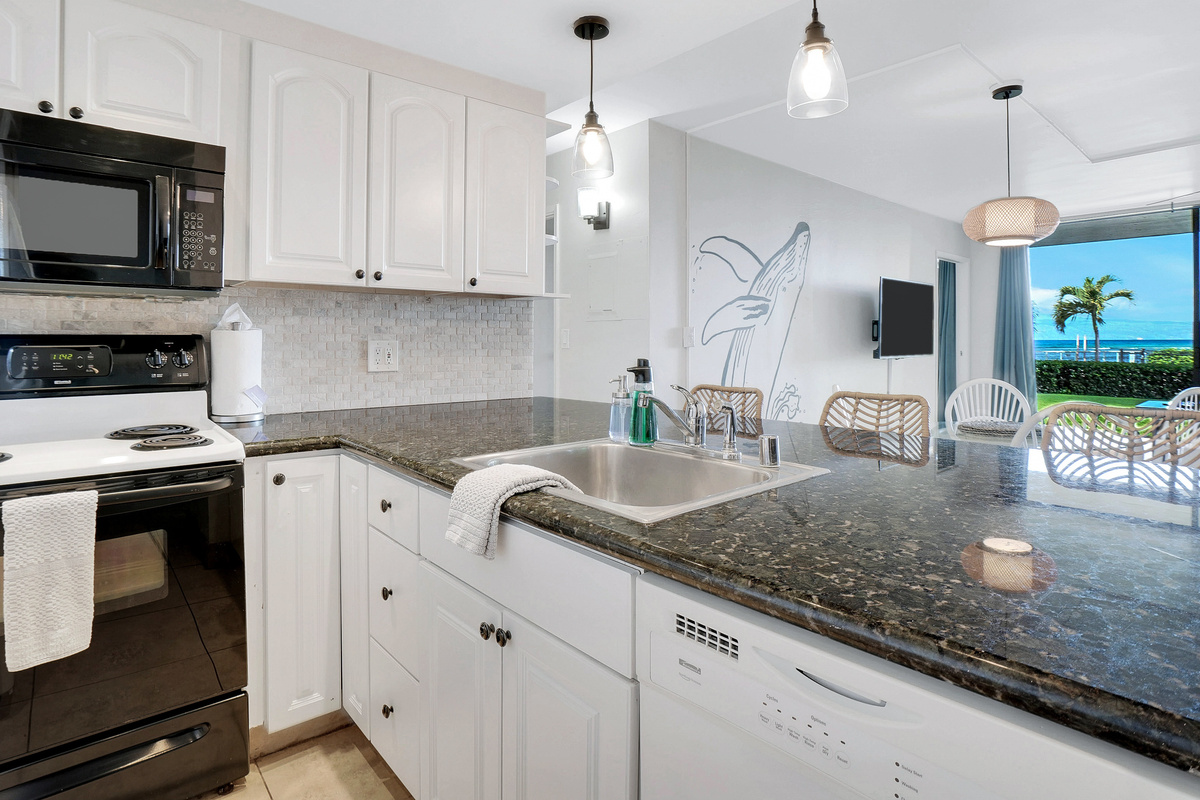 Spacious kitchen, equipped to cook up all your favorites! Plus, you can be a chef with a view!