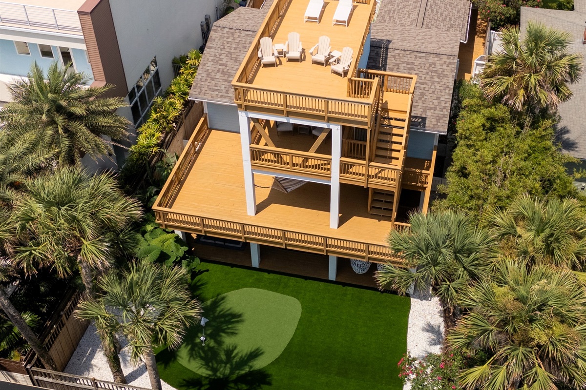 Your backyard oasis - lush landscaping, outdoor lounge spaces, and plenty of room to unwind