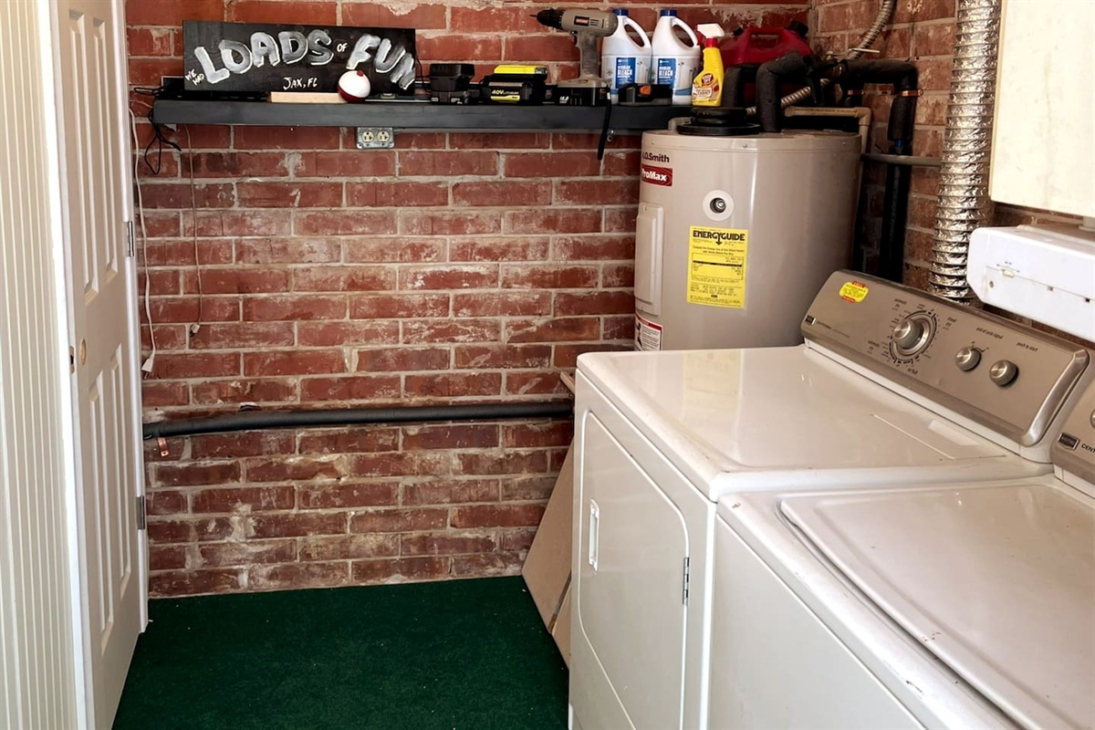 LAUNDRY ROOM
You'll have loads of fun here!
Enter Laundry Room from carport. 

A small amount of laundry detergent is stocked for your convenience.  Need more? Dollar General is just a few blocks away!