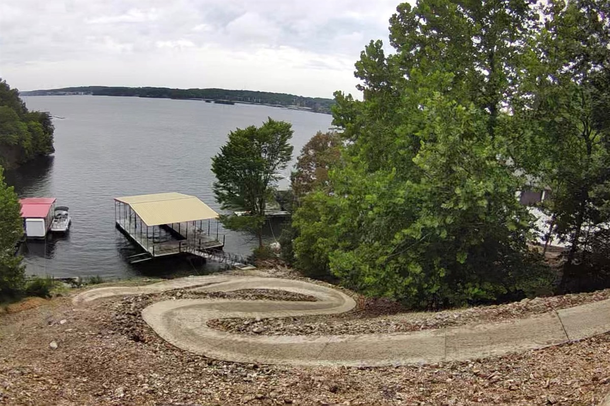 The walk to and from the dock is rather steep. We are working on finding a solution to relandscape. Only the physically fit will be able to walk this pathway to the dock. 