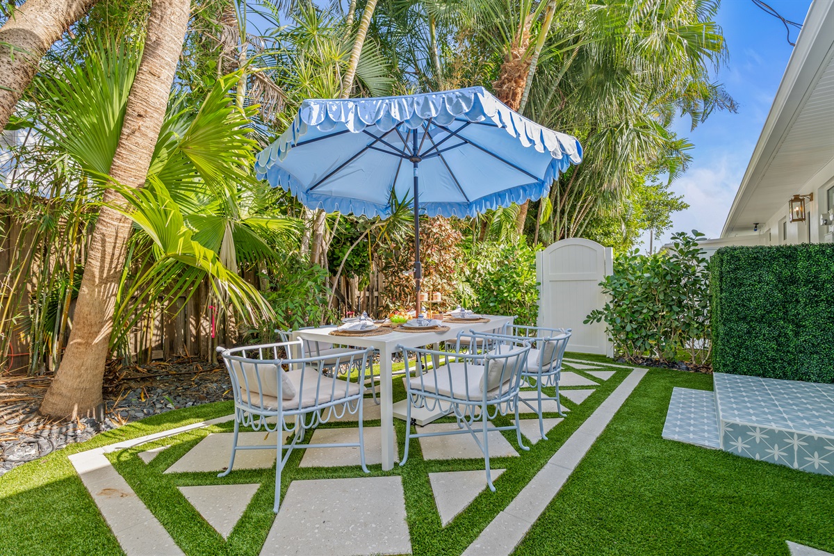 Enjoy al fresco dining under the shade of our signature blue umbrellas.