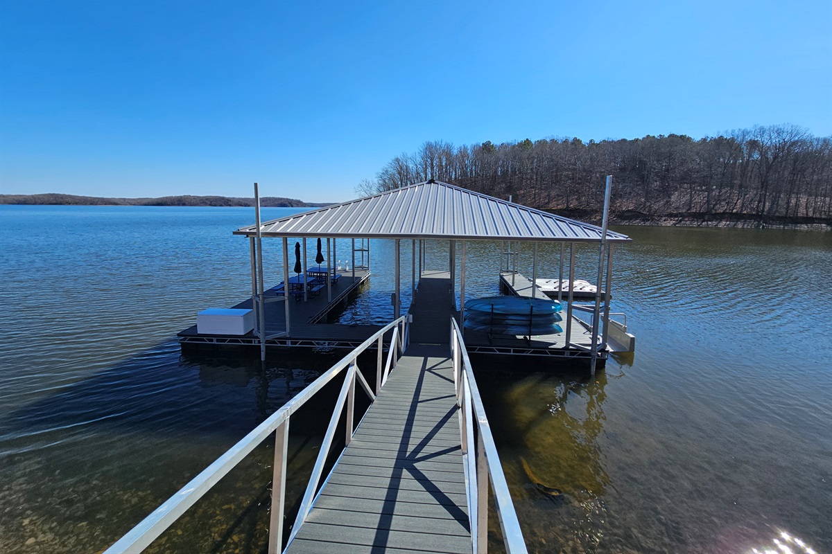 New covered dock + kayaks ready to launch