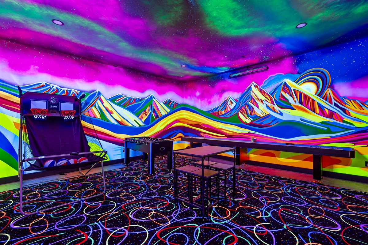 Black lights and arcade games - a winning combo.