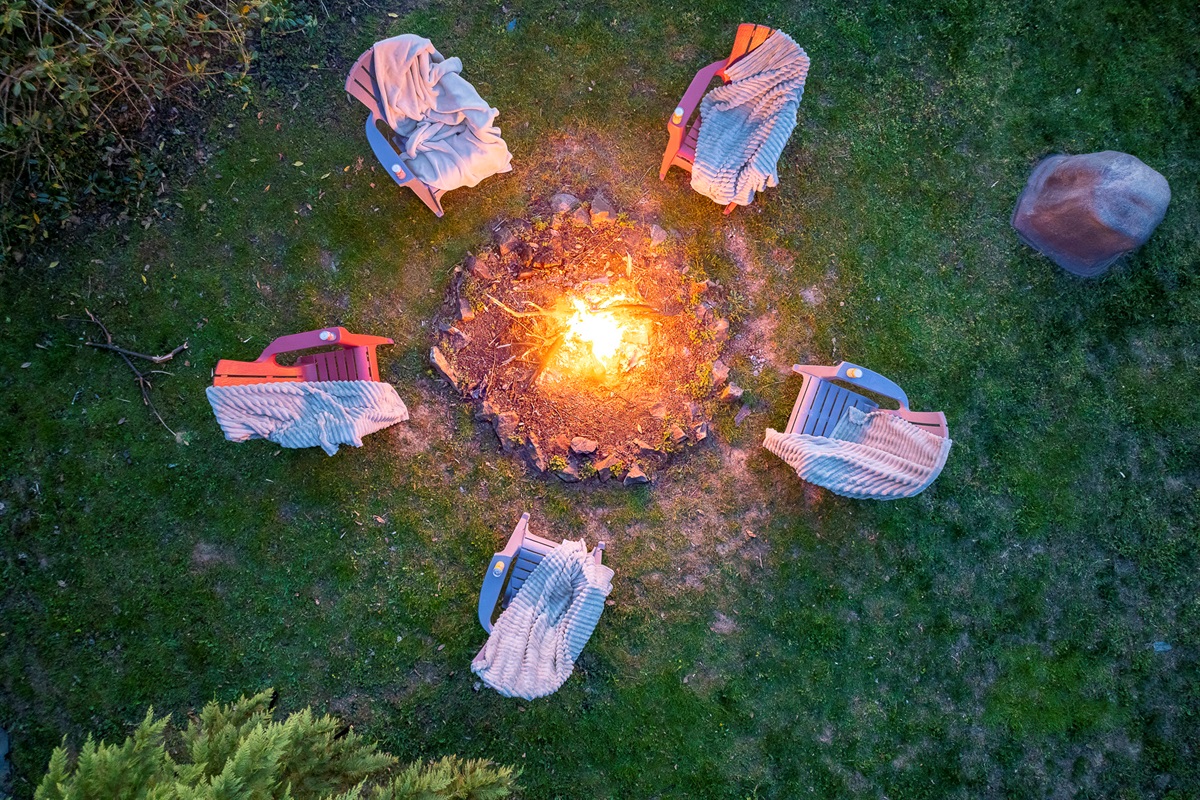 Fire Pit Retreat: Gather around the warm glow and create unforgettable memories under the stars!

