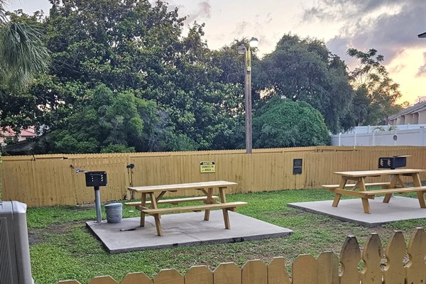 Grilling area and picnic tables for outdoor eating