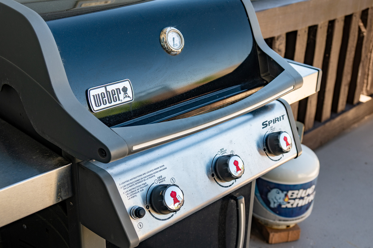 Weber gas grill ready for lakeside cookouts and outdoor dining.