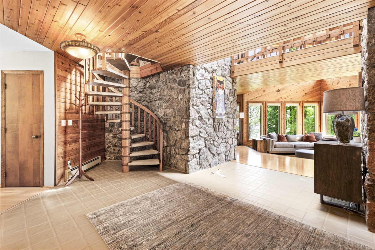Beautiful spiral staircase to the upper level.