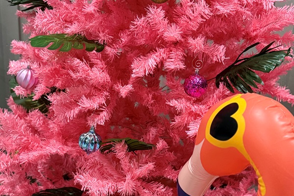 The pool room has a tropical vibe for the 2025 holiday season!   Oh what fun!!!! 