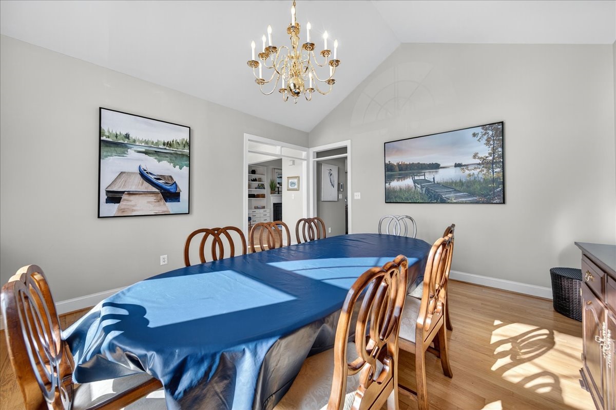 Elegant dining space with natural light and lake-inspired décor.