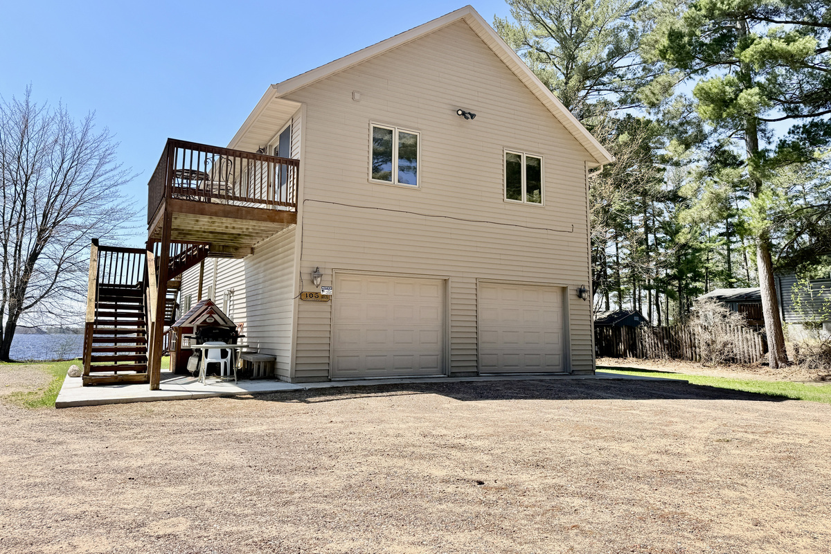 Exterior - Rear of Duplex with Stairway to Upper Level