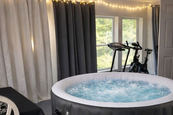 Hot tub uncovered. It heats up to 104 degrees. We offer preheating if you&rsquo;d like it to be ready upon arrival . We treat it properly after every guest and change the water very frequently unlike hotels. 