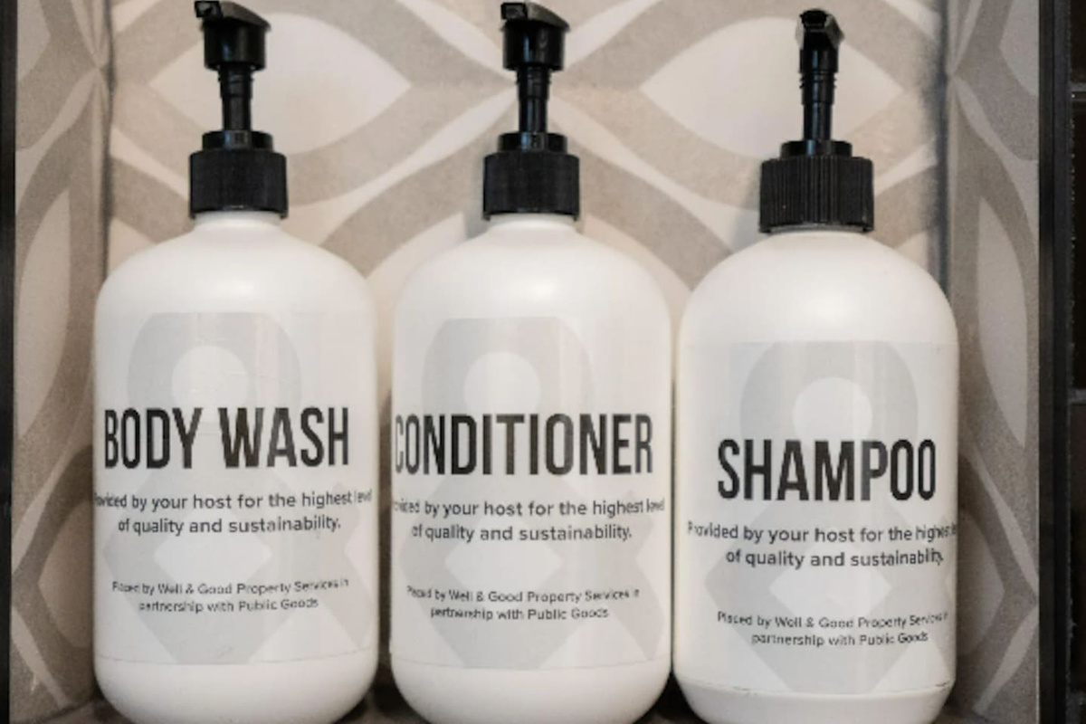 Full-size body wash, conditioner, and shampoo, stocked and ready — the small details that make a stay feel taken care of.