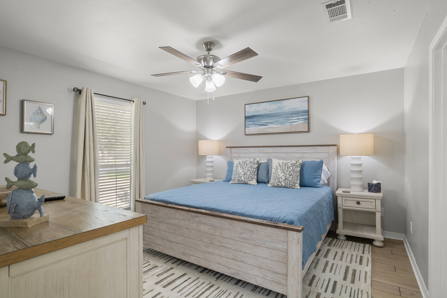 Relax and recharge in the primary bedroom after a day in the Florida Sunshine