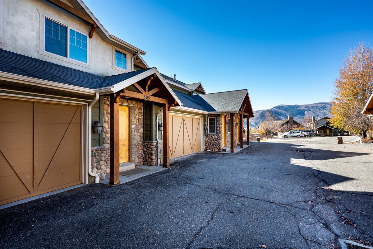 Beautiful exterior featuring rustic stone accents and mountain views — a warm welcome to your getaway.