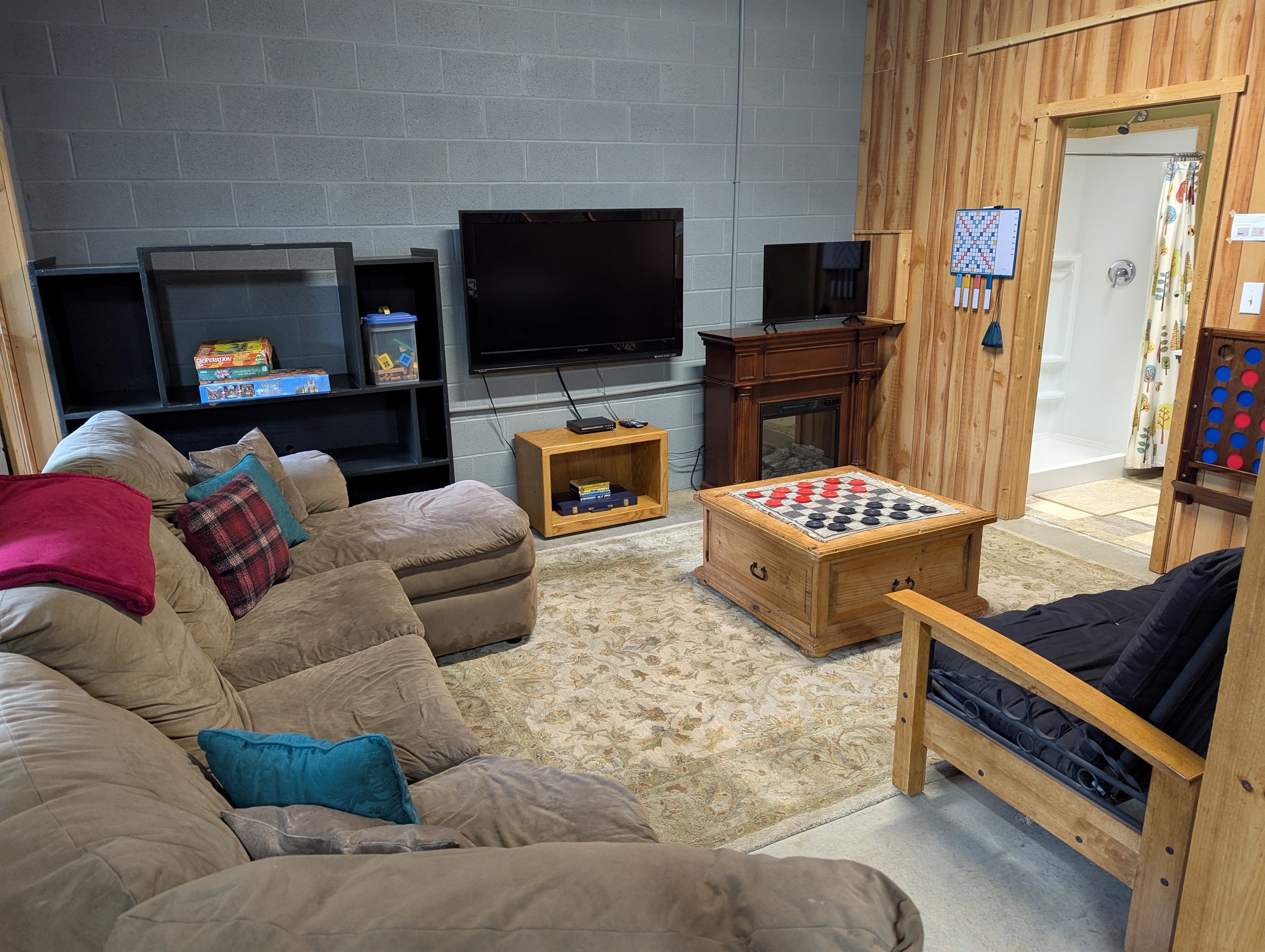 Sleeper futon in basement game room