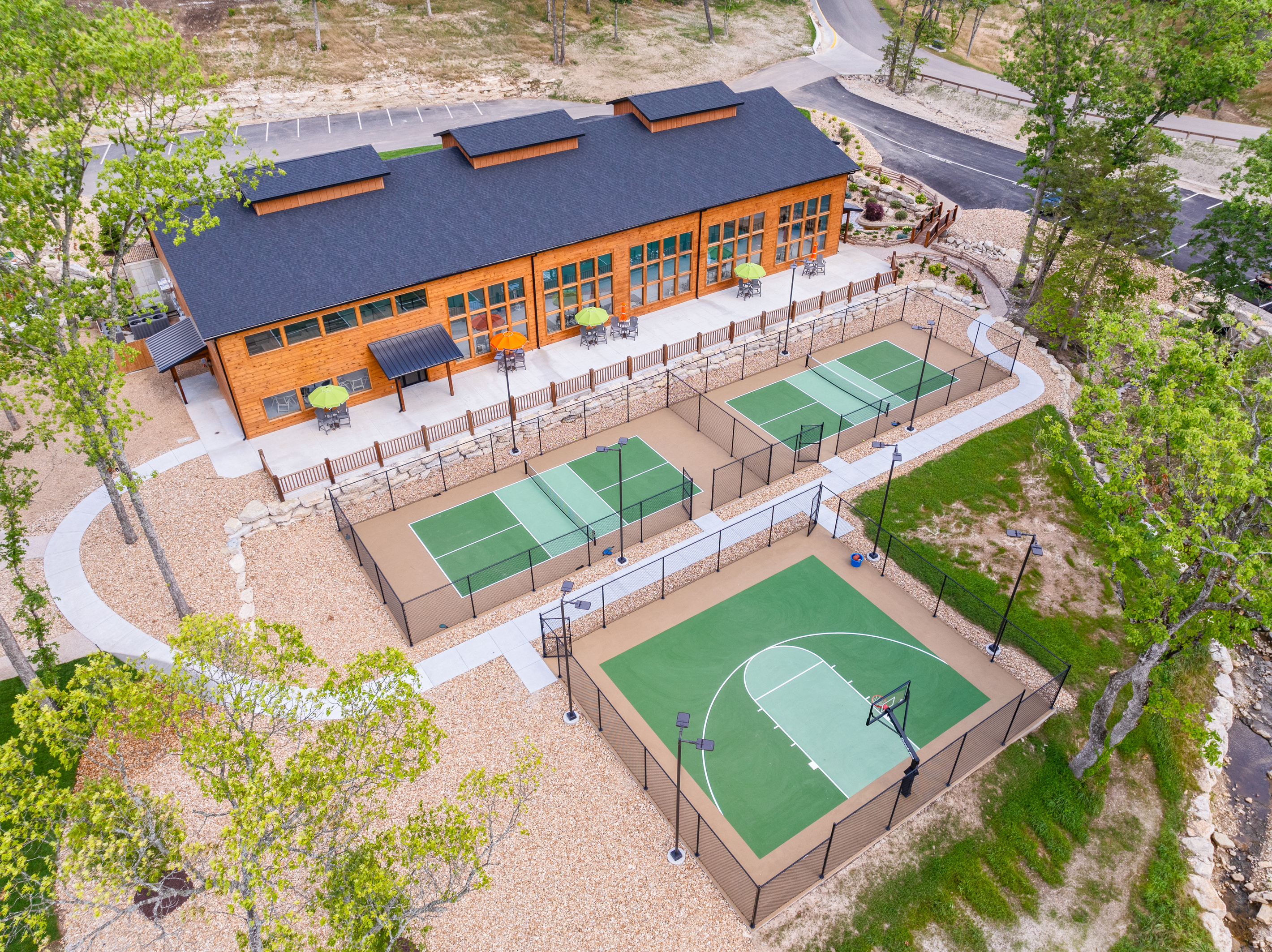 Pickleball courts, basketball court and play area for kids of all ages.
