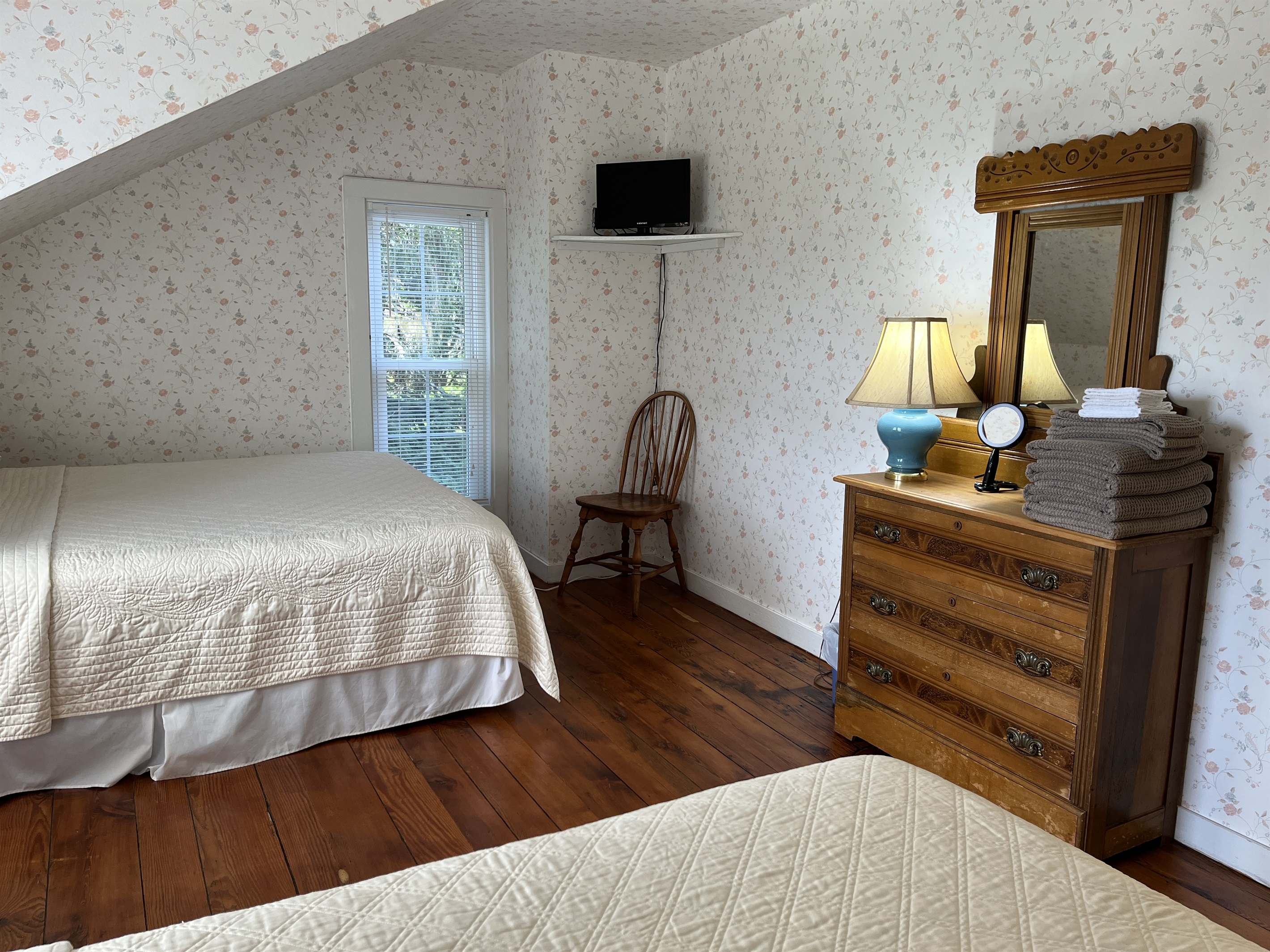 2nd floor family suite bedroom #5 w/ double bed and queen bed.