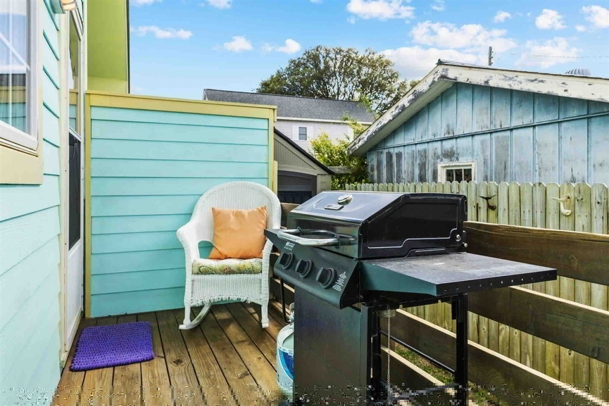 Propane grill on the back deck.