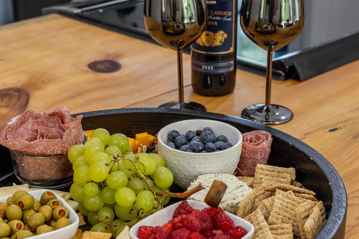Whether it's a charcuterie spread, takeout, or a home-cooked feast, this is the perfect place to gather.
