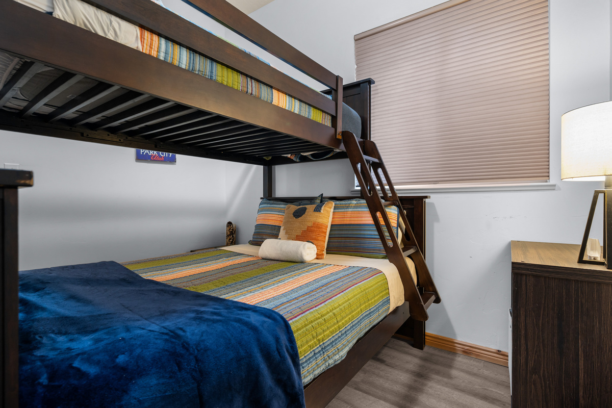 Ideal for families or groups, the second bedroom offers a twin-over-full bunk bed and a comfortable, welcoming vibe.