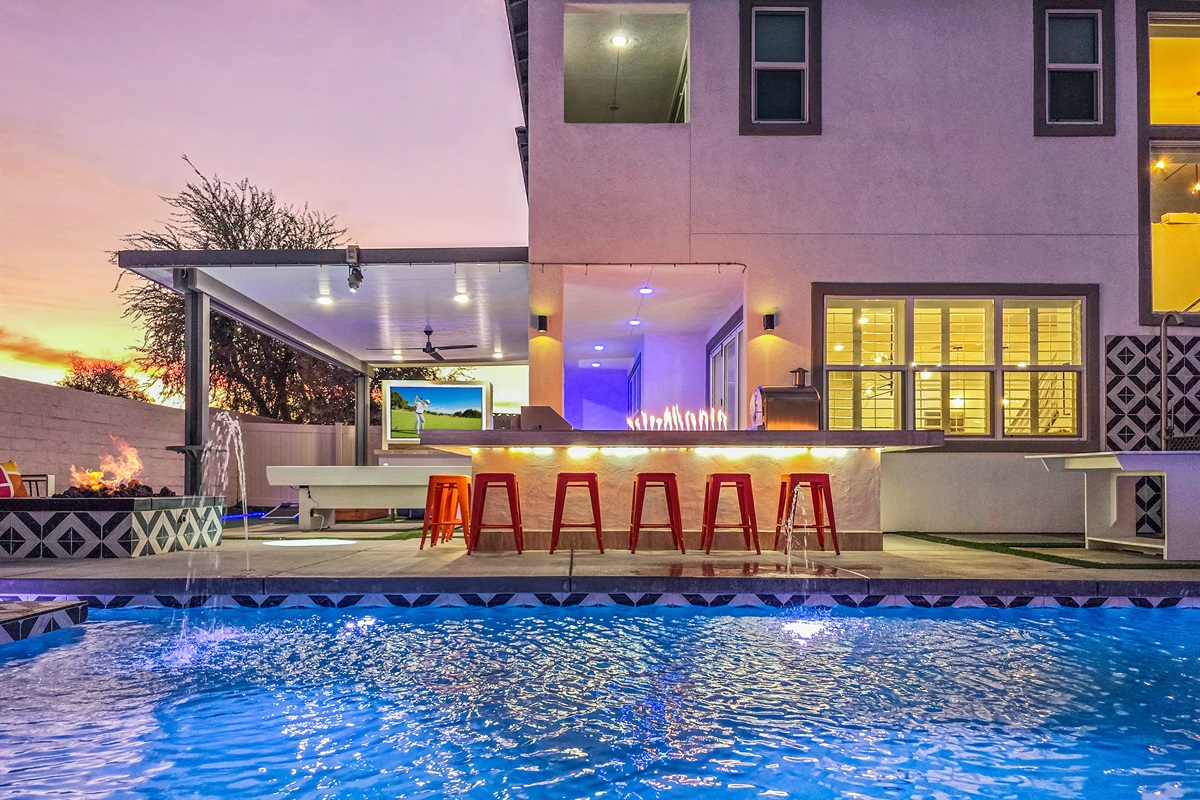 This backyard isn't just about a pool. It's about entertaining the entire family! The Brooklyn has three different fire features outside, including the bar countertop fire.