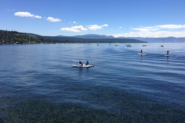 Paddle boarding off private pier