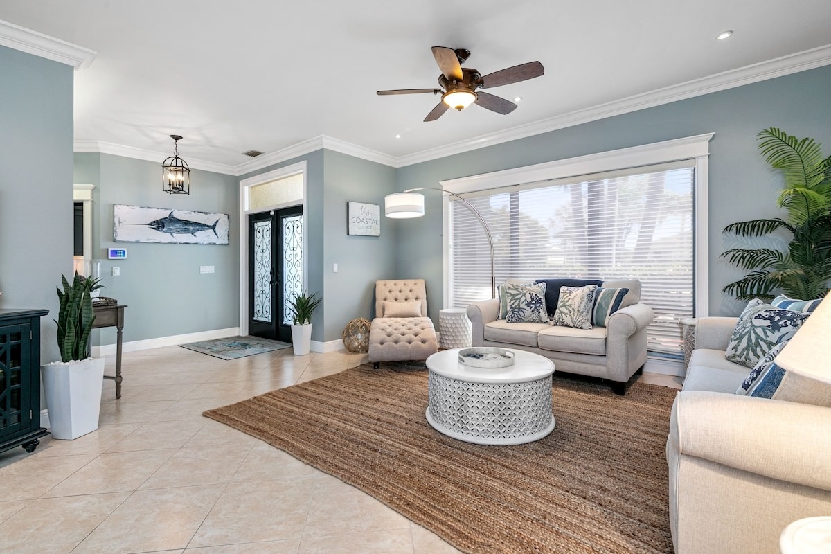 Inviting front room greets you with warmth and light
