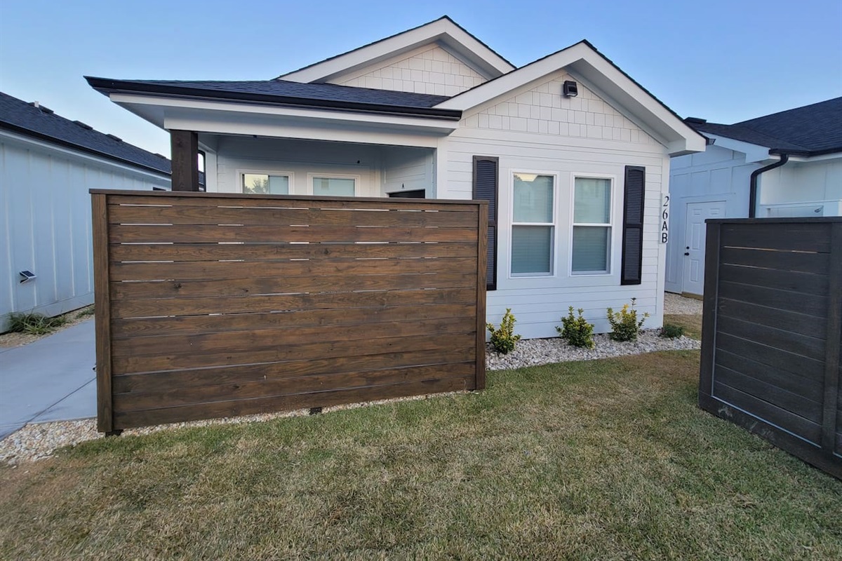 Unit is all one level and the patio has a privacy screen.  
