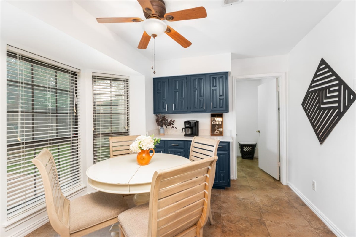 Kitchen + dining open layout with modern finishes.