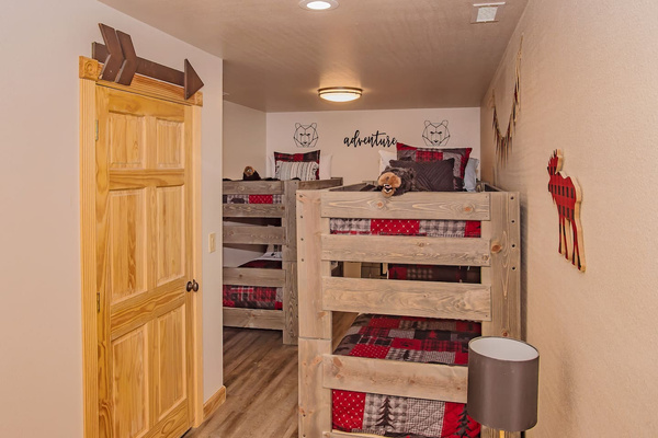 Rustic bunks in red plaid for a sleepover they'll never forget, Splashing at the Bluff