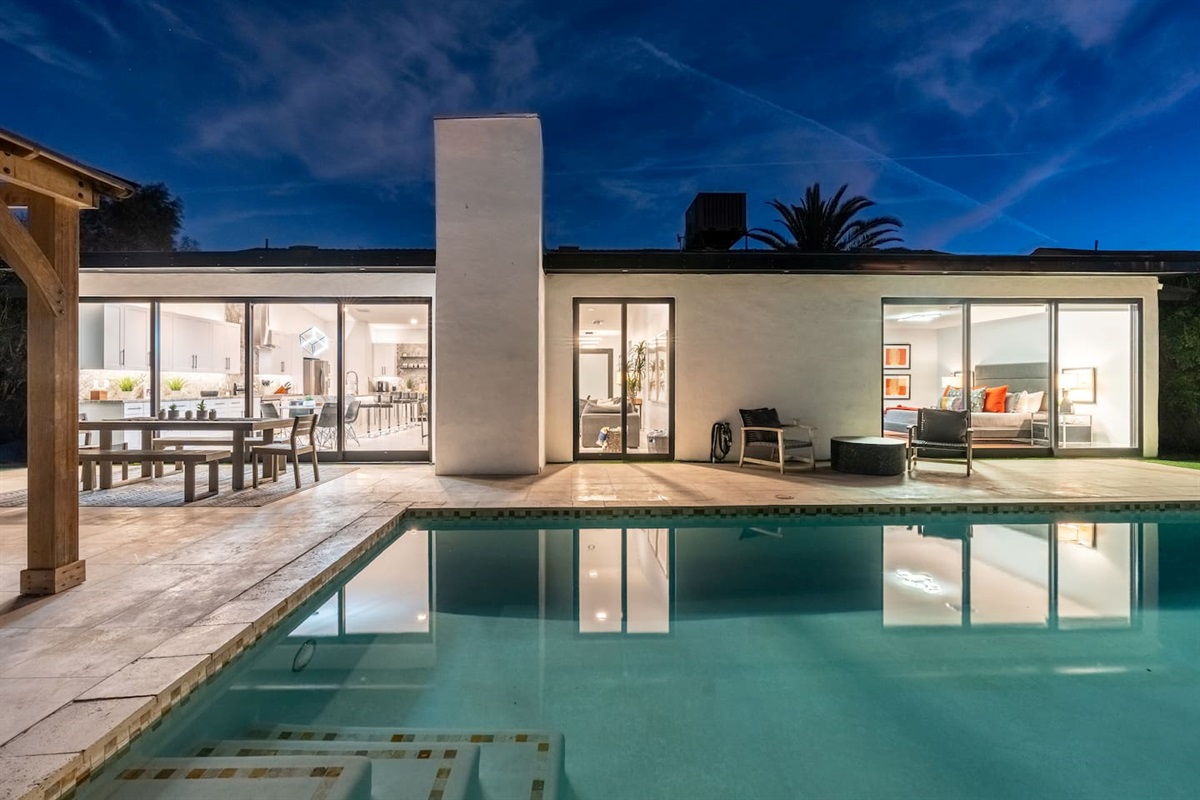 Enjoy effortless flow from the sleek interior to the expansive patio and pool—perfect for entertaining or a quiet evening dip.