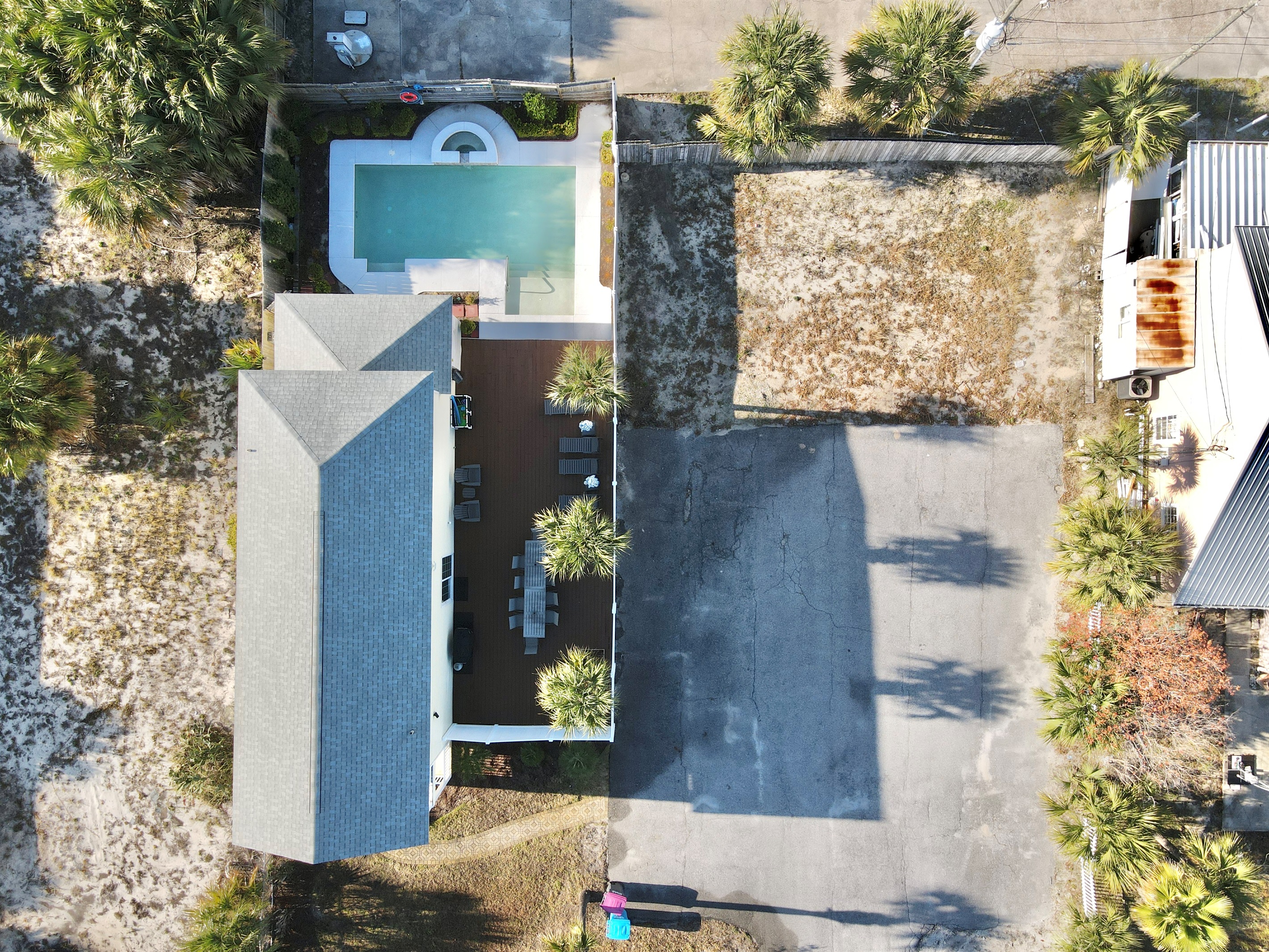 Overhead view of house and private parking lot