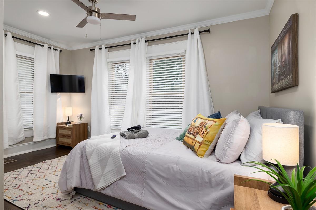 Dream Easy: Restful bedrooms featuring comfortable beds and comfy linens to ensure a peaceful night's sleep. We have a TV in every room! Get in touch to explore our custom concierge services a