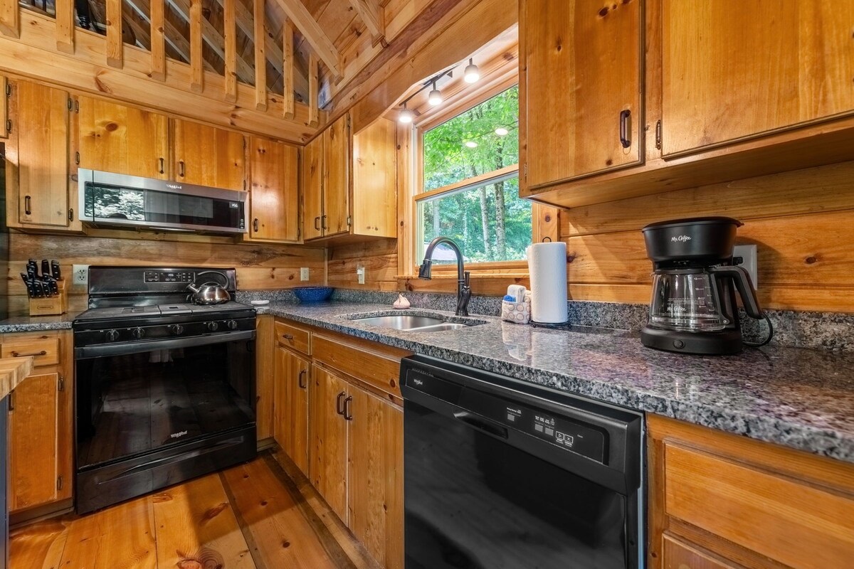 Well stocked kitchen for cooking meals.