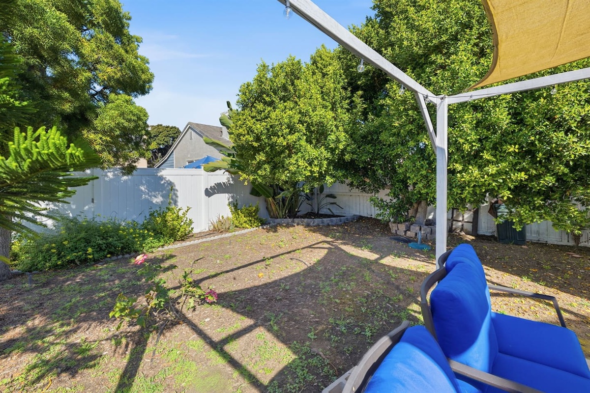 Covered patio with backyard access and BBQ grill. Great for al fresco dining after a day at Oxnard Beach.