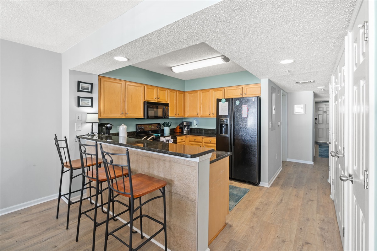 Breakfast Bar in the Well Stocked Kitchen 