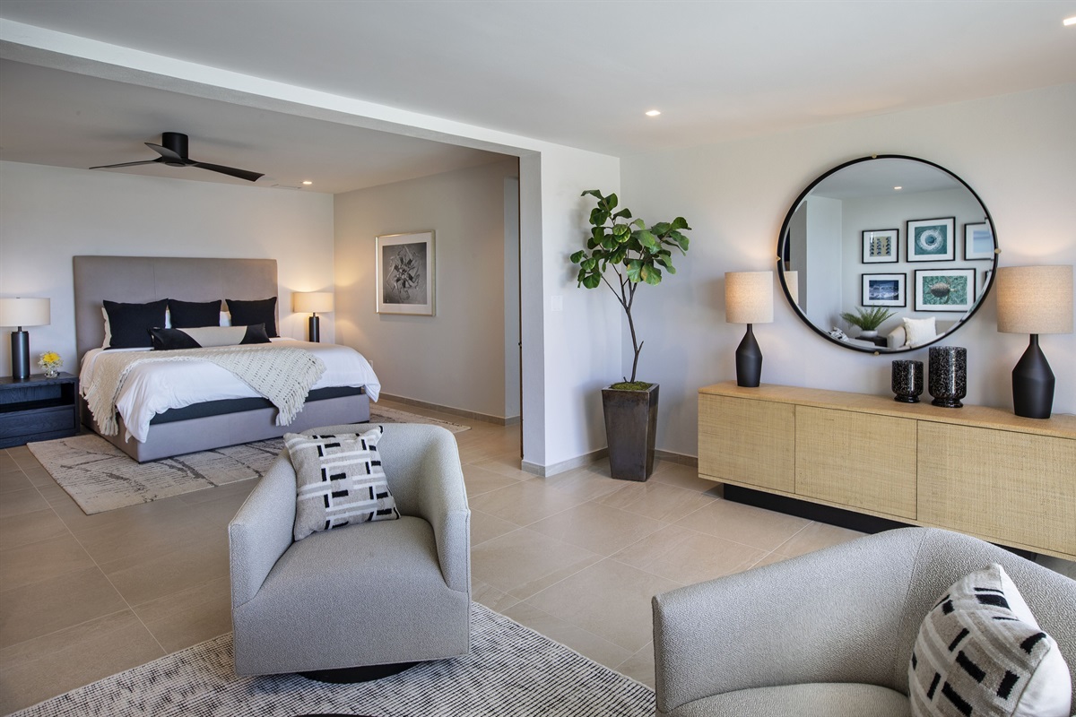 Main level primary bedroom that is located just off the kitchen.