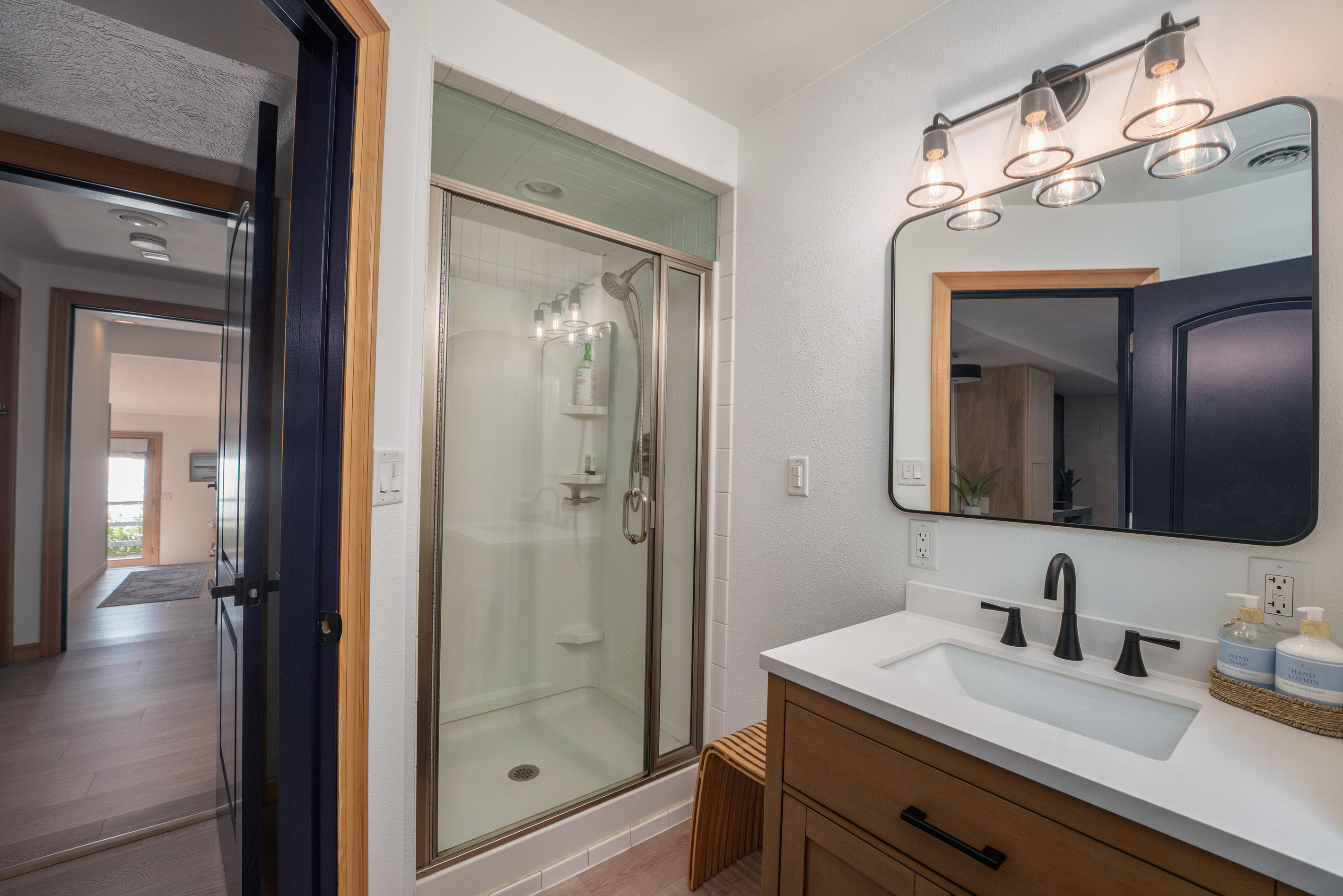 Full bathroom with stand up shower located inside Bedroom 2