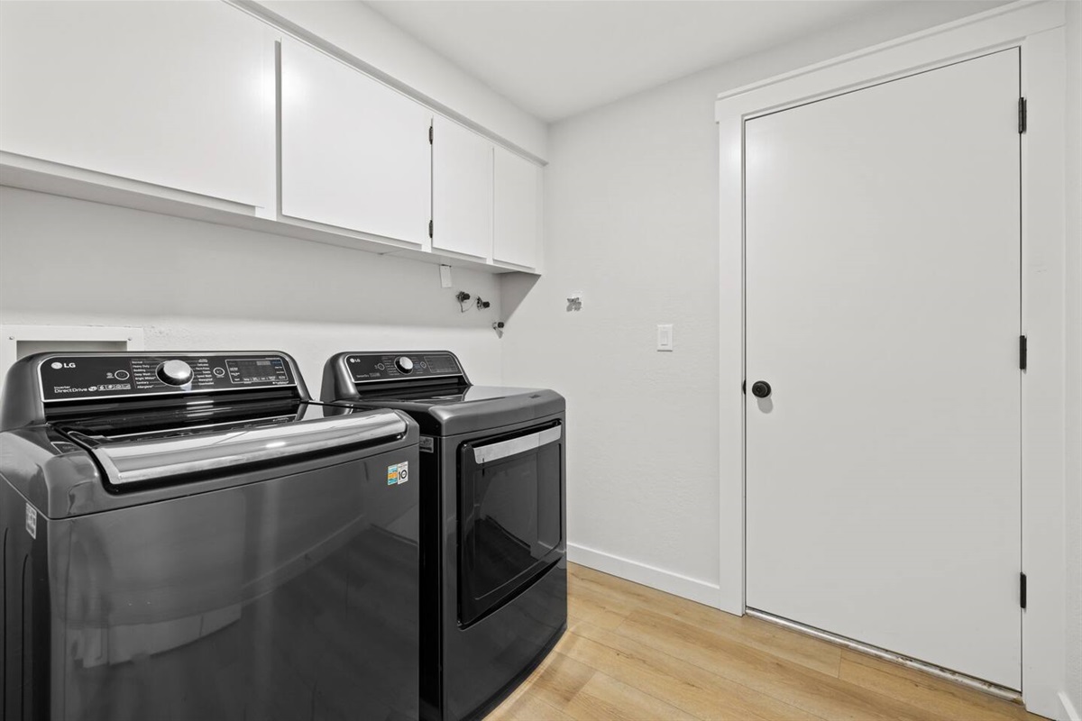 Indoor, private laundry with full size washer and dryer