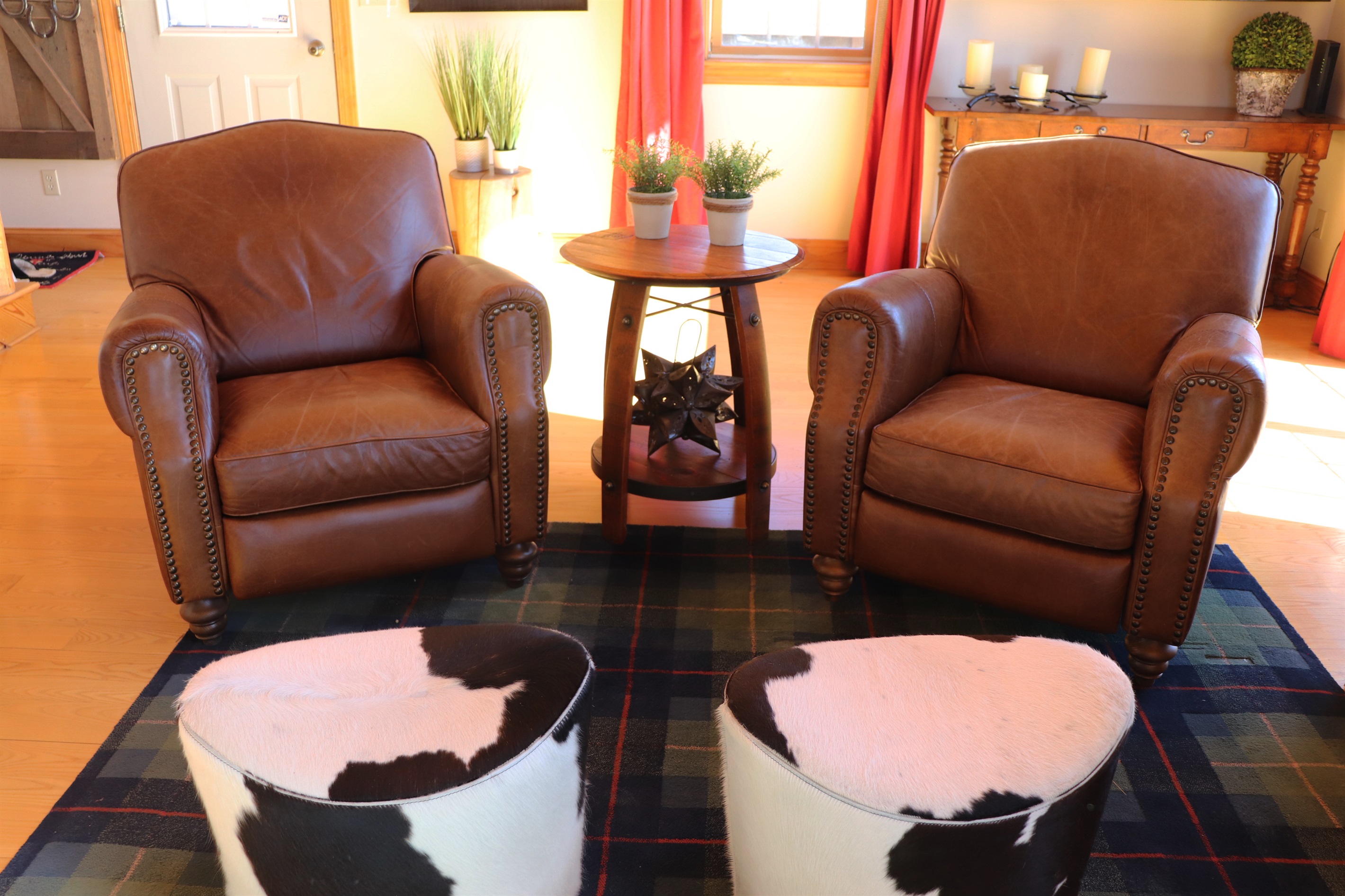 Relax in the plush leather recliners in the living room.