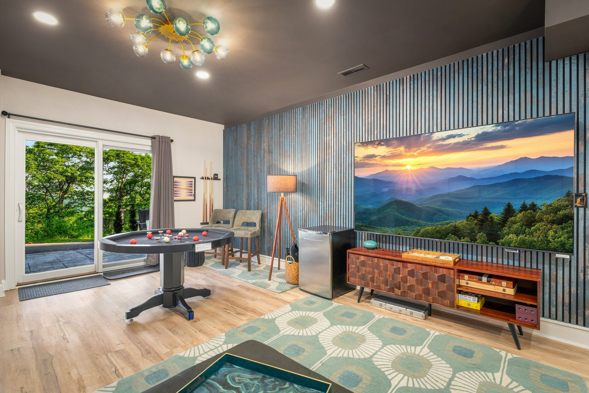 Host movie nights or poker marathons around the 85” smart TV in a space styled for comfort, cocktails, and competition