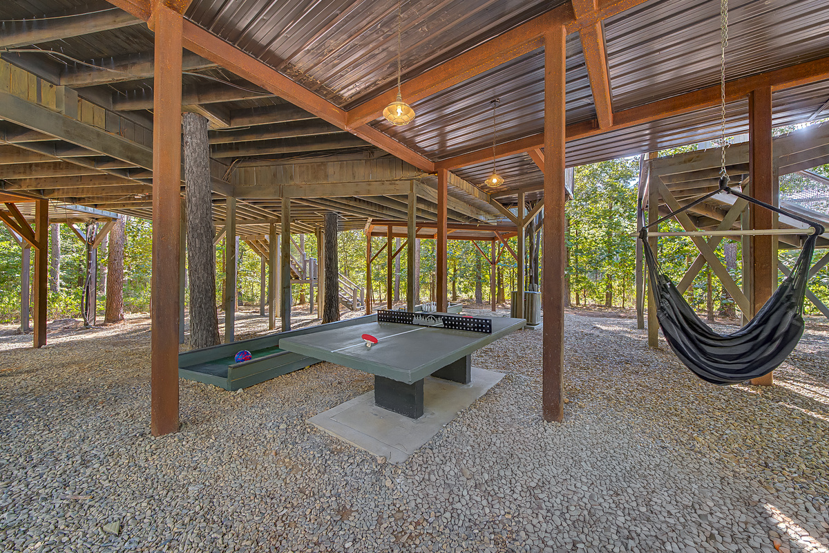 Games, swings, and room to spread out — the covered play area gives everyone something to do without splitting up the group.