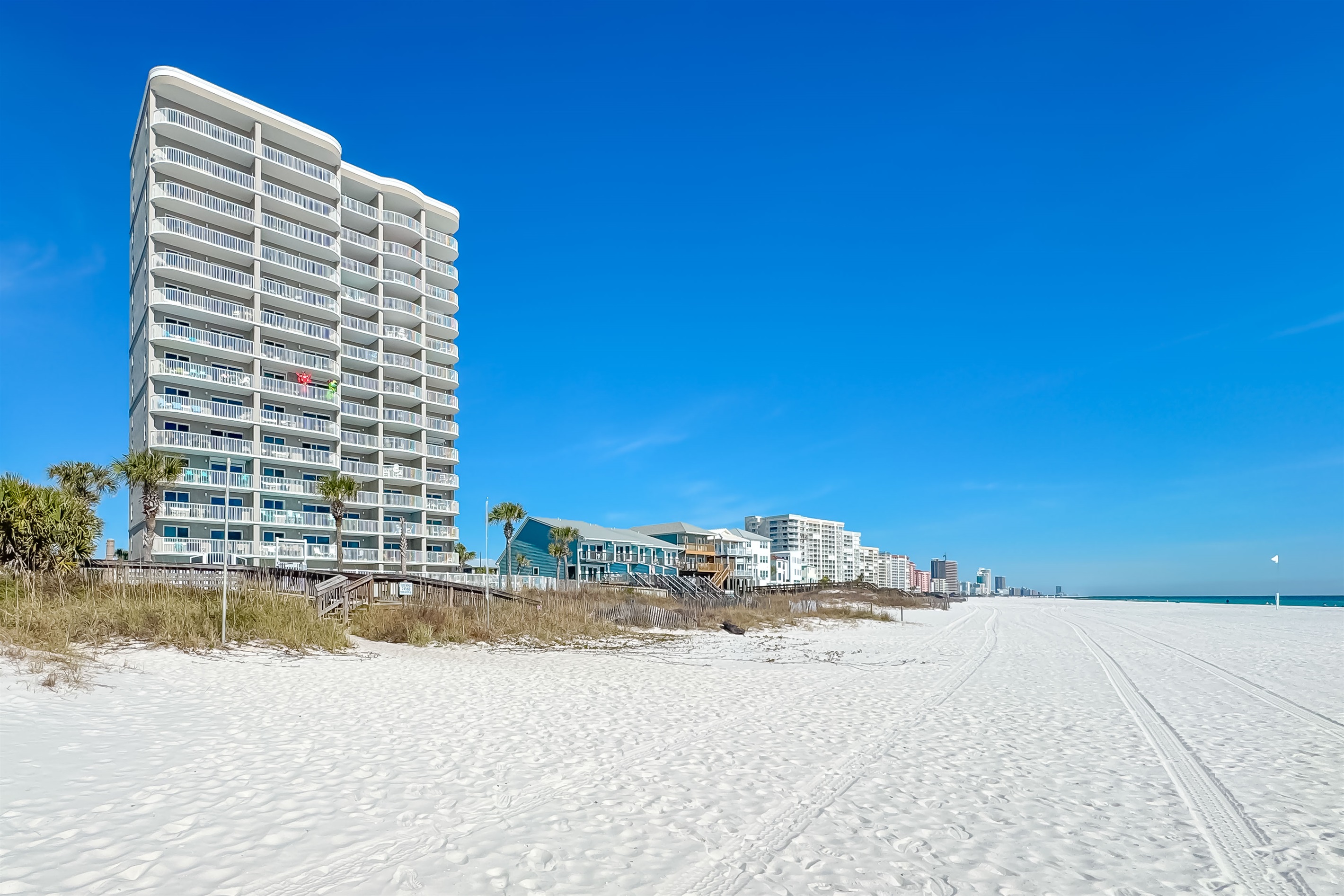Experience the thrill of waking up to the ocean steps from your condo. This beachfront building is your gateway to the perfect vacation.