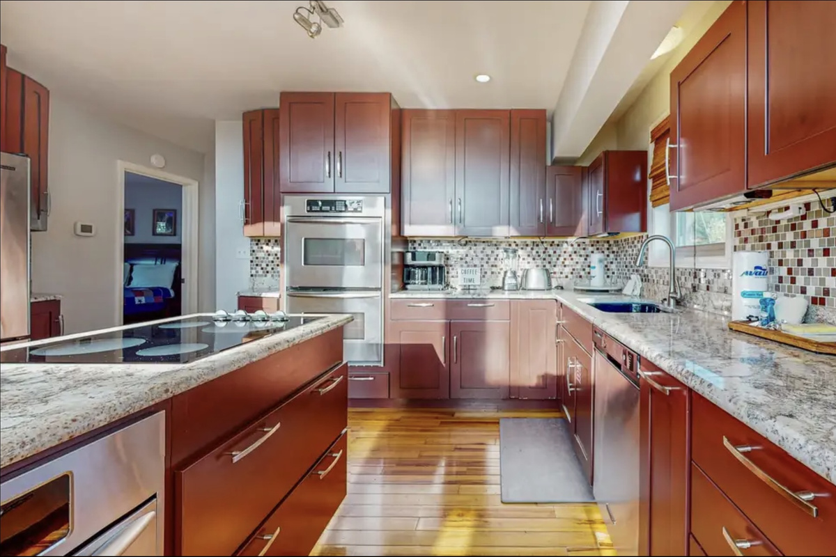 Microwave drawer, double ovens, smooth cooktop, dishwasher and oversized refrigerator