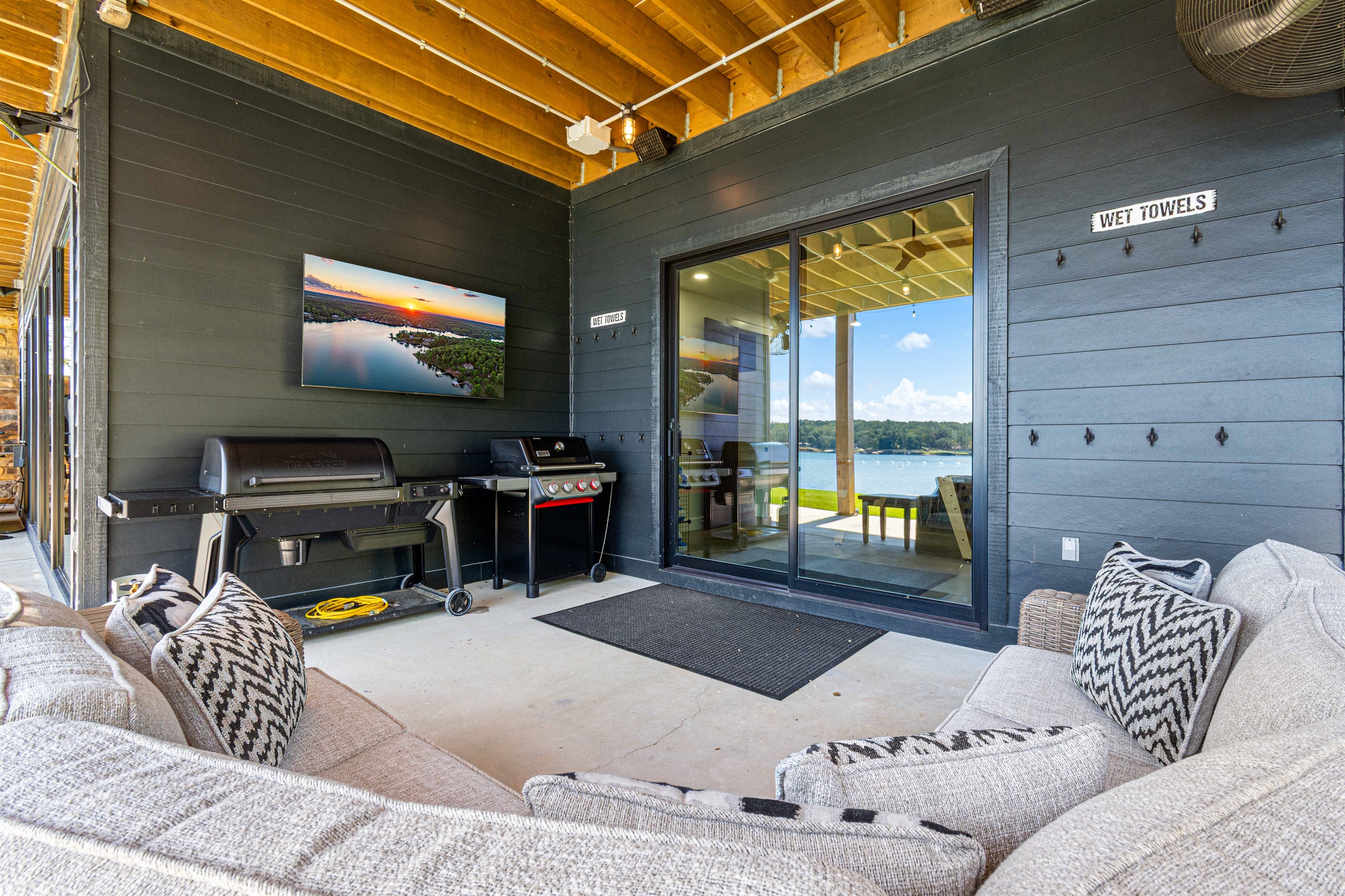 Outdoor gas grill, electric smoker and entertaining area.