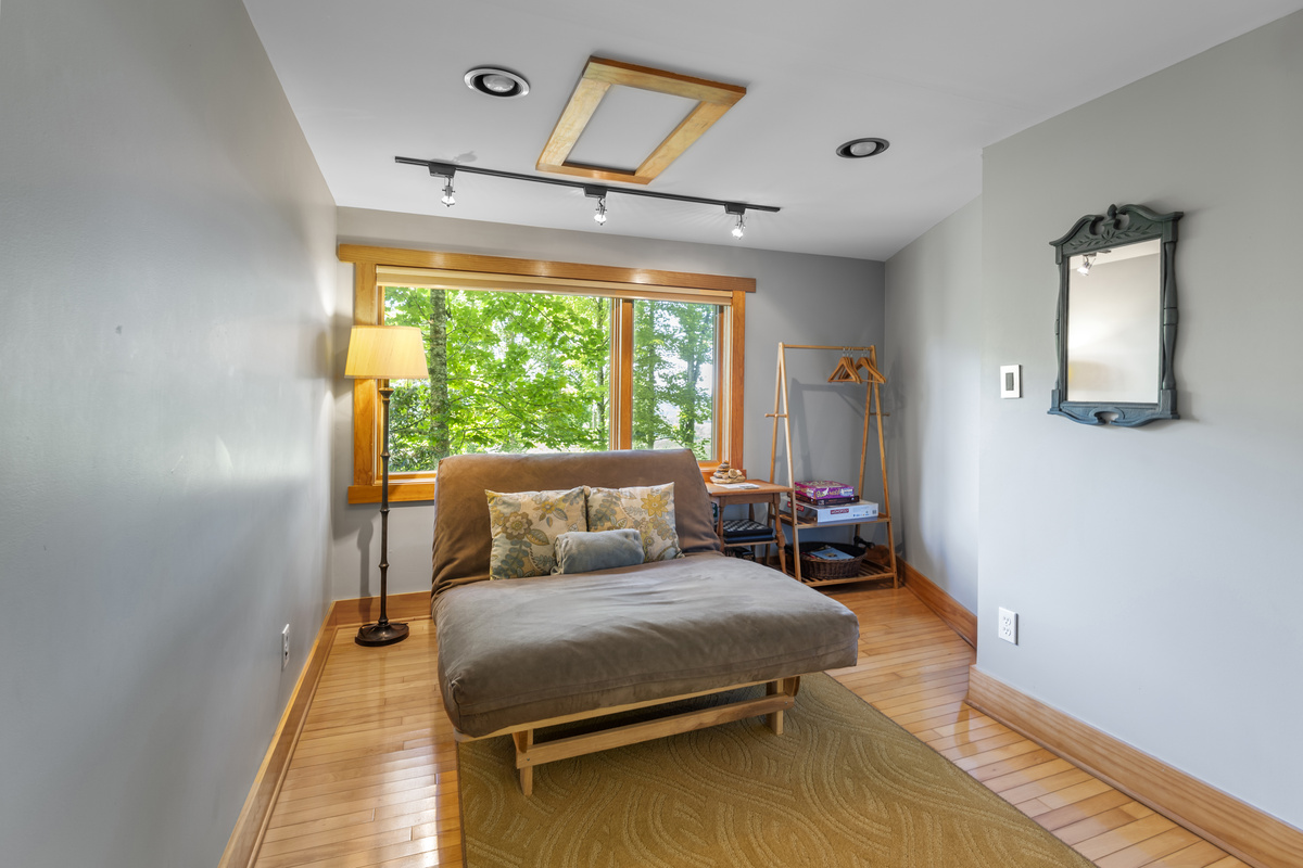 Futon room/office sits between the main room and the primary bedroom
