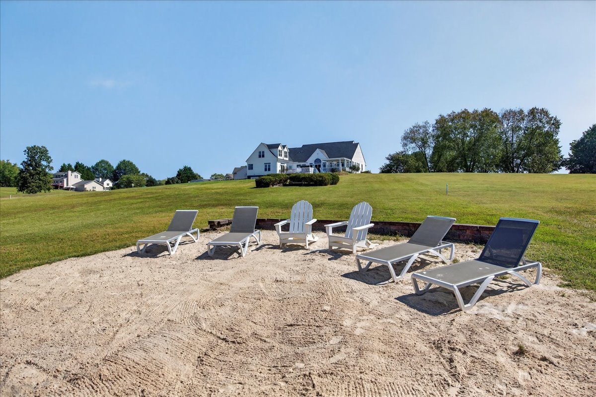 Spacious lakefront retreat with private beach, boathouse, and plenty of room for family and friends to make memories.