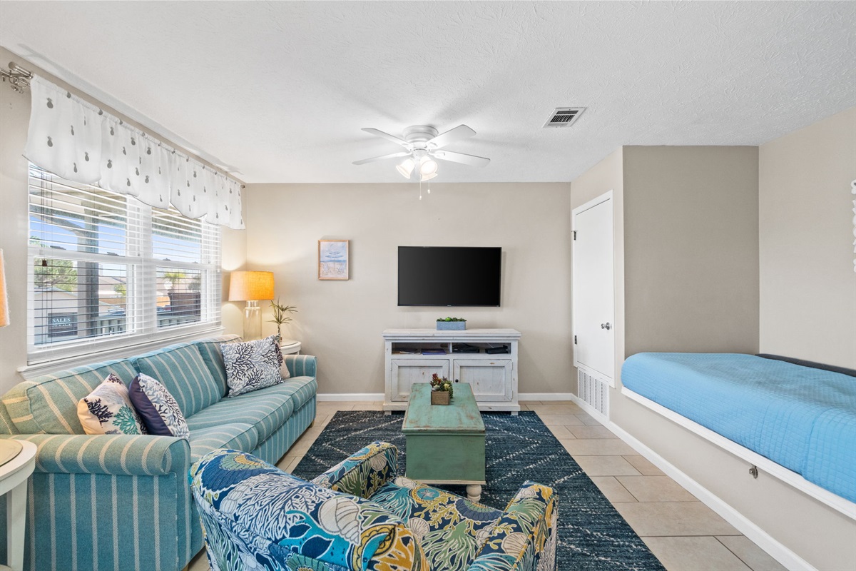 Living Room with Queen Sleeper Sofa and Twin Bed