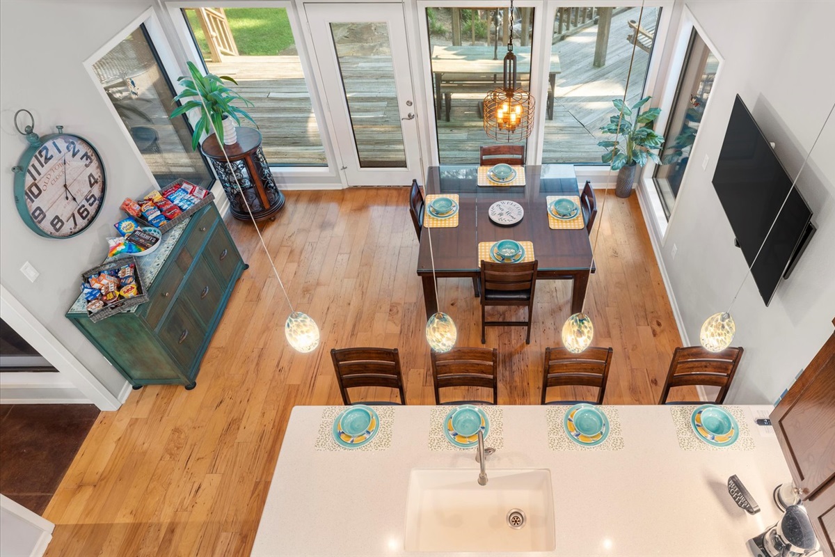This is the view of the dining room from the children’s loft—a fun and thoughtful design that lets parents and kids stay connected without running up and down the stairs.